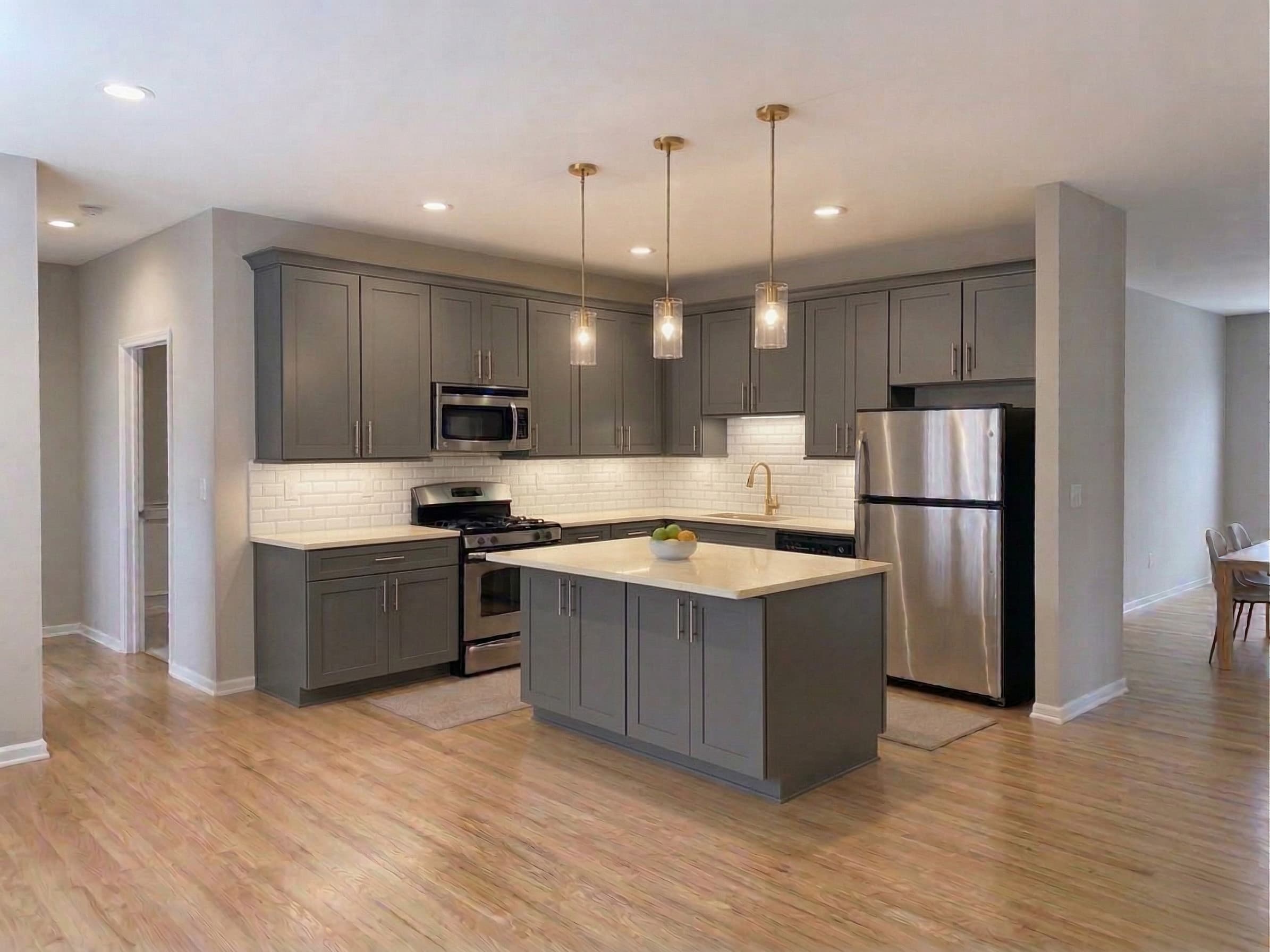 Grey cabinet finish — Gauntlet grey · Gold hardware