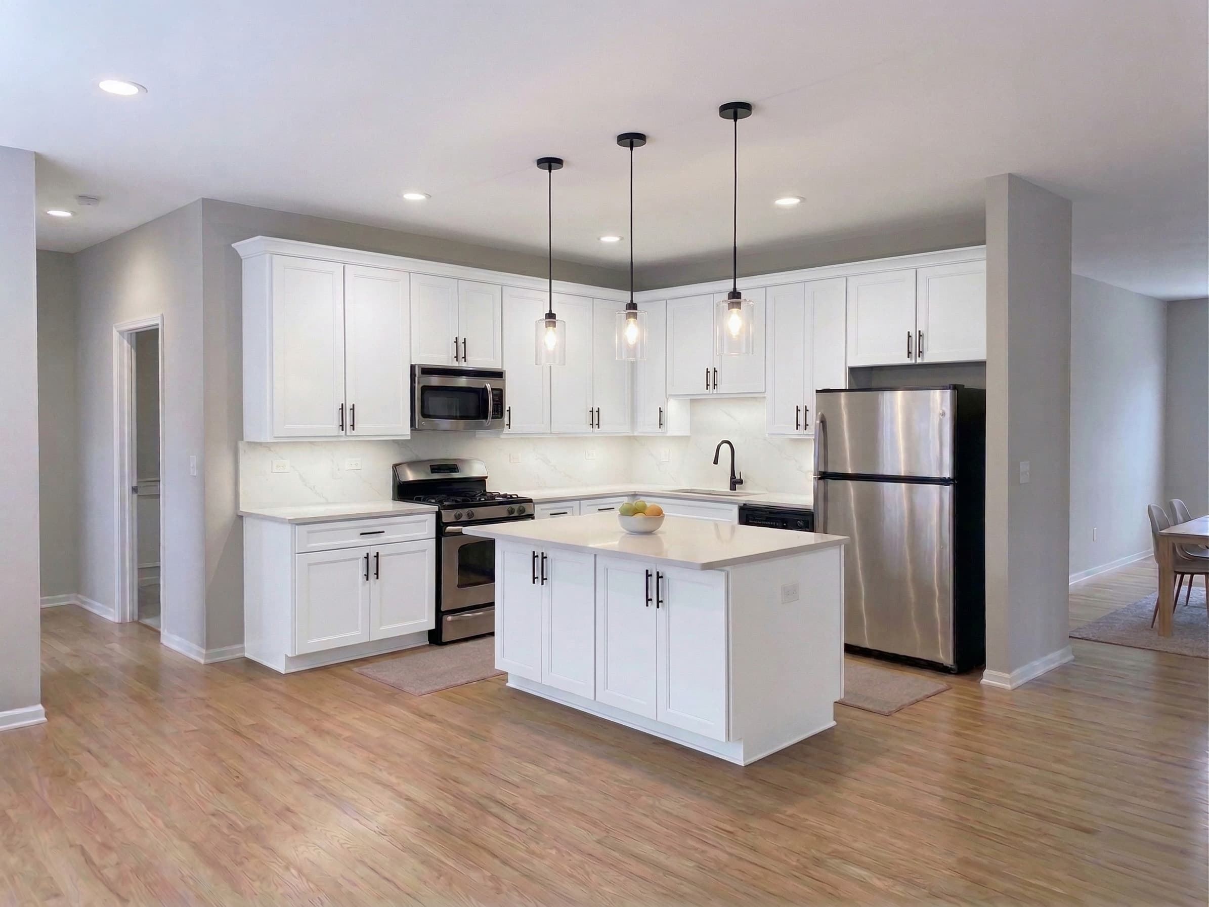 White cabinet finish — Pure white shaker · Black hardware